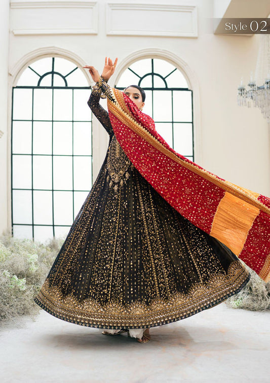 Aik Atelier Wz 02 Black Beauty Chiffon Maxi Frock For Wedding Bridal black and gold traditional outfit with a red and gold dupatta, standing indoors.