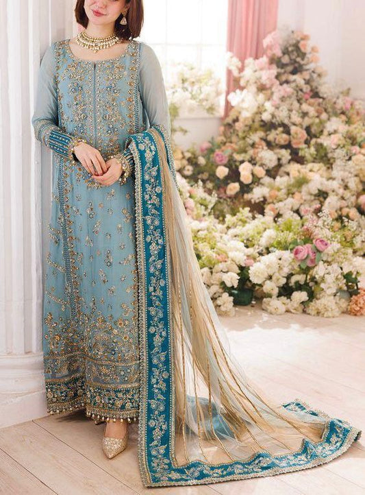 Charizma Luxury light blue embroidered traditional outfit with a floral background