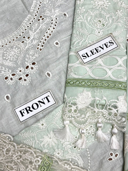 Fabric with intricate patterns and labels indicating 'Front' and 'Sleeves'.