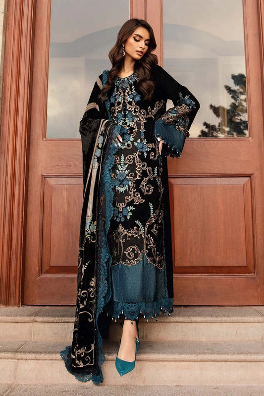MAria b Palachi VElvet Dress Formal embroidered black and blue dress standing in front of a wooden door.